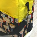 Bolso carro bebé kokeshi con amarillo detalle