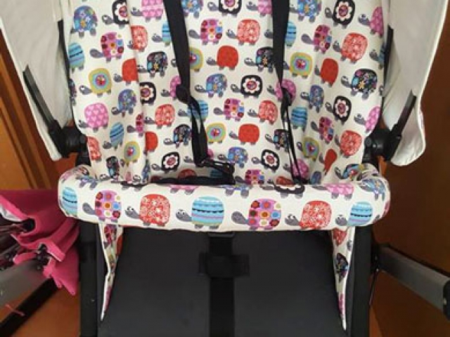 Funda de asiento y capota para Bugaboo con tela de tortugas